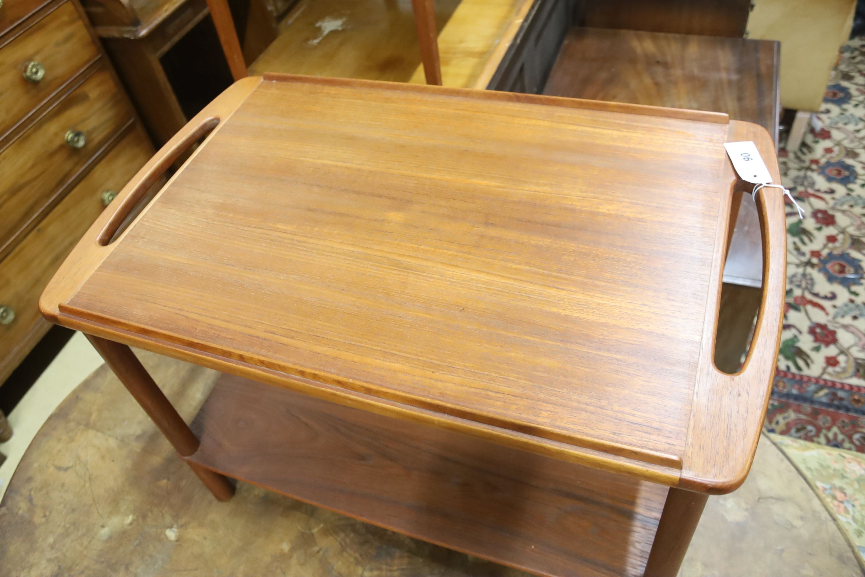 A mid century design Danish style teak two-tier occasional table, width 74cm, depth 44cm, height 48cm